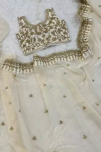 Cream embroidered saree with gold sequins-work