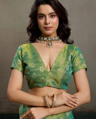 Green tissue silk blend woven partywear saree 5