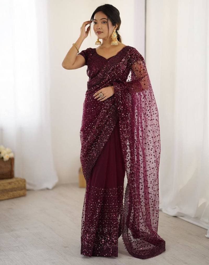 Wine embroidered net saree  with sequins work