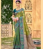 Green color woven designer soft silk fabric for ethnic party looks