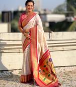 Cream color paithani silk fabric woven designer saree