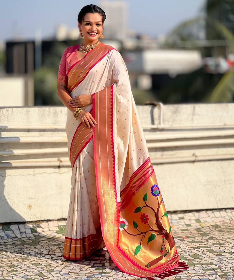Cream color paithani silk fabric woven designer saree