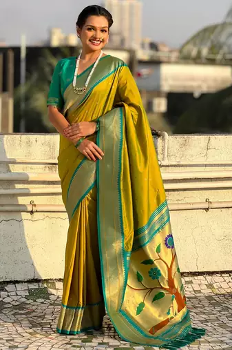 Mahendi color paithani silk fabric woven designer saree