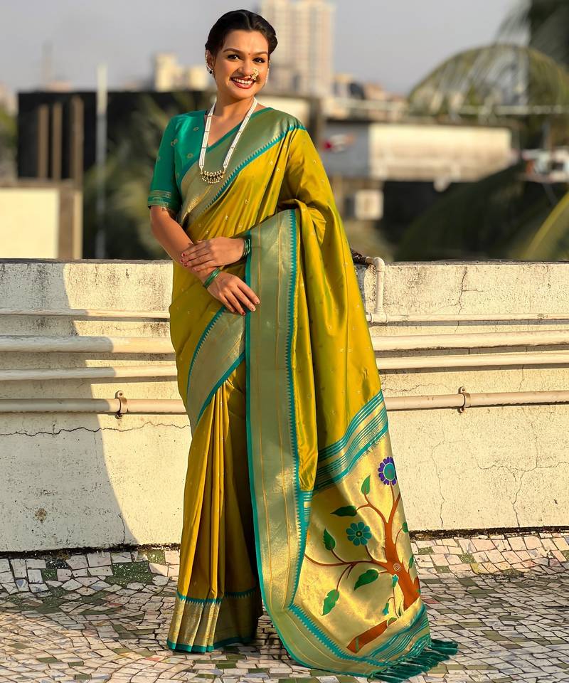Mahendi color paithani silk fabric woven designer saree