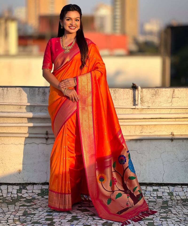 Orange color paithani silk fabric woven designer saree
