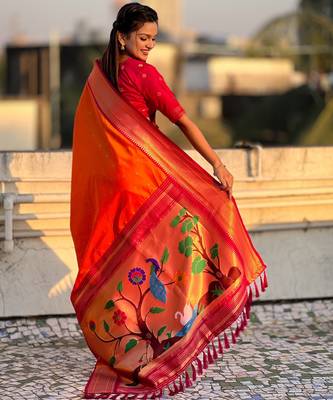 Orange paithani silk blend woven saree 2