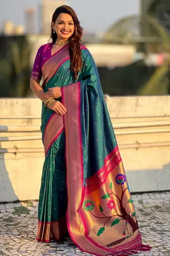 Teal color paithani silk fabric woven designer saree