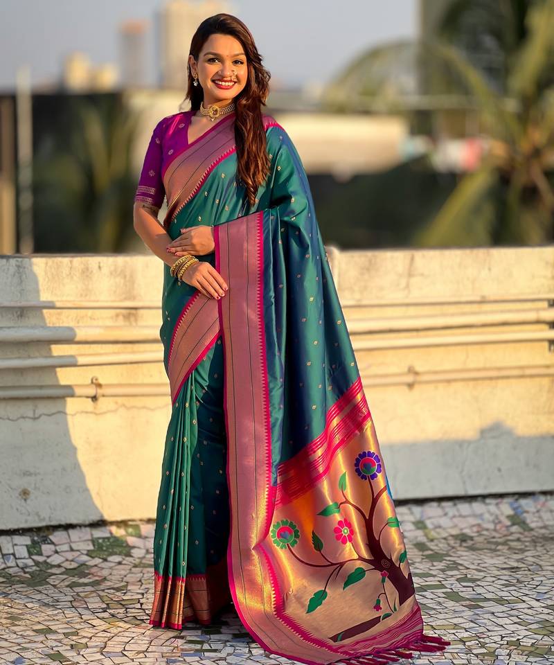 Teal color paithani silk fabric woven designer saree