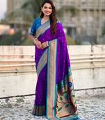 Purple color paithani silk fabric woven designer saree