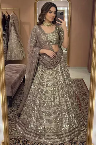 Champagne Gold Faux Georgette Lehenga with Heavy Sequins, Zari & Dori Work