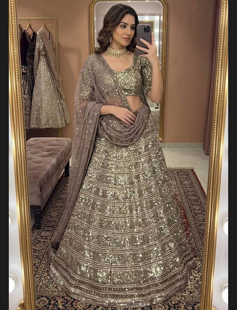 Champagne Gold Faux Georgette Lehenga with Heavy Sequins, Zari & Dori Work