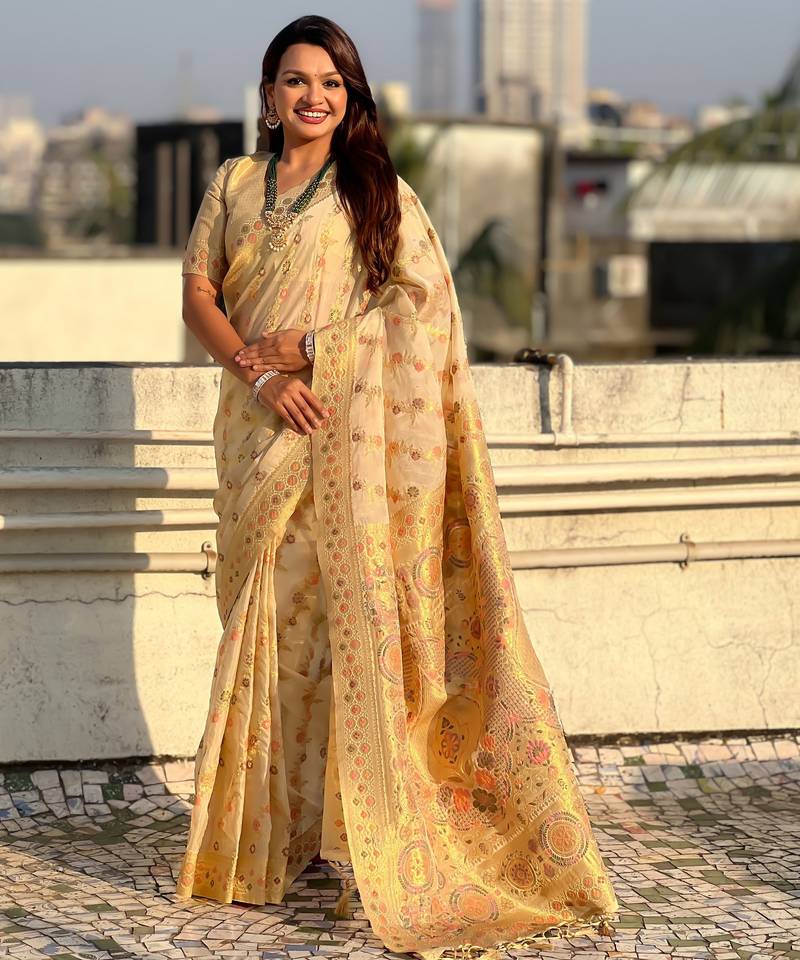 Cream color kora silk fabric woven leheria designer saree