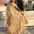 Cream color kora silk fabric woven leheria designer saree