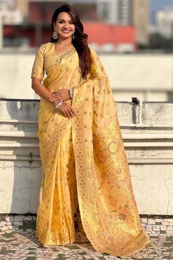 Yellow color kora silk fabric woven leheria designer saree