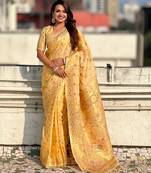 Yellow color kora silk fabric woven leheria designer saree