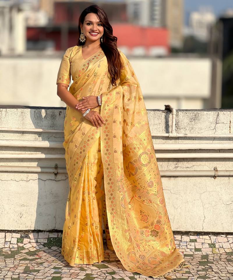 Yellow color kora silk fabric woven leheria designer saree