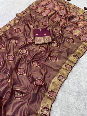 gold tissue saree with zarkan work tassel design 2