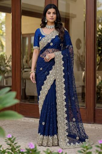 Blue color net fabric wedding wear heavy embroidery work with pearls diamonds work saree