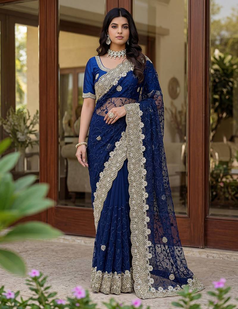 Blue color net fabric wedding wear heavy embroidery work with pearls diamonds work saree