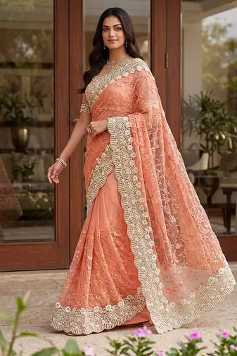 Blue color net fabric wedding wear heavy embroidery work with pearls diamonds work saree