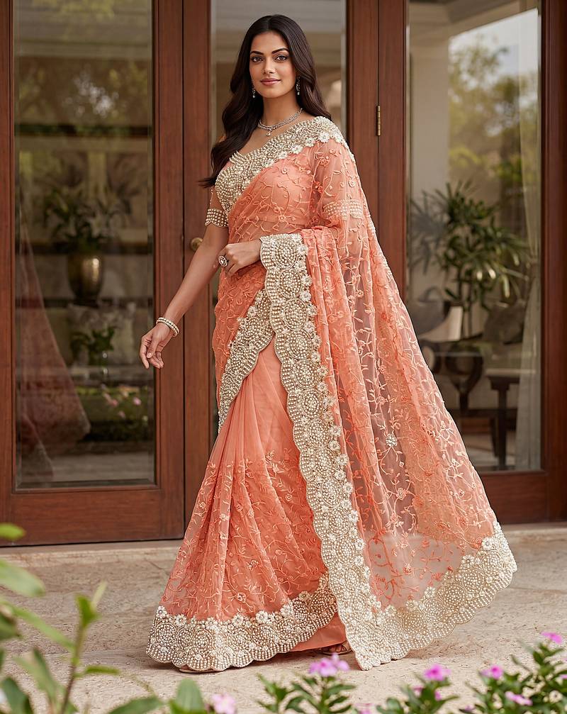 Blue color net fabric wedding wear heavy embroidery work with pearls diamonds work saree