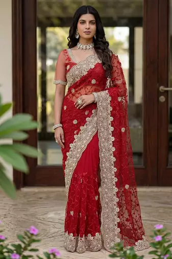 Blue color net fabric wedding wear heavy embroidery work with pearls diamonds work saree