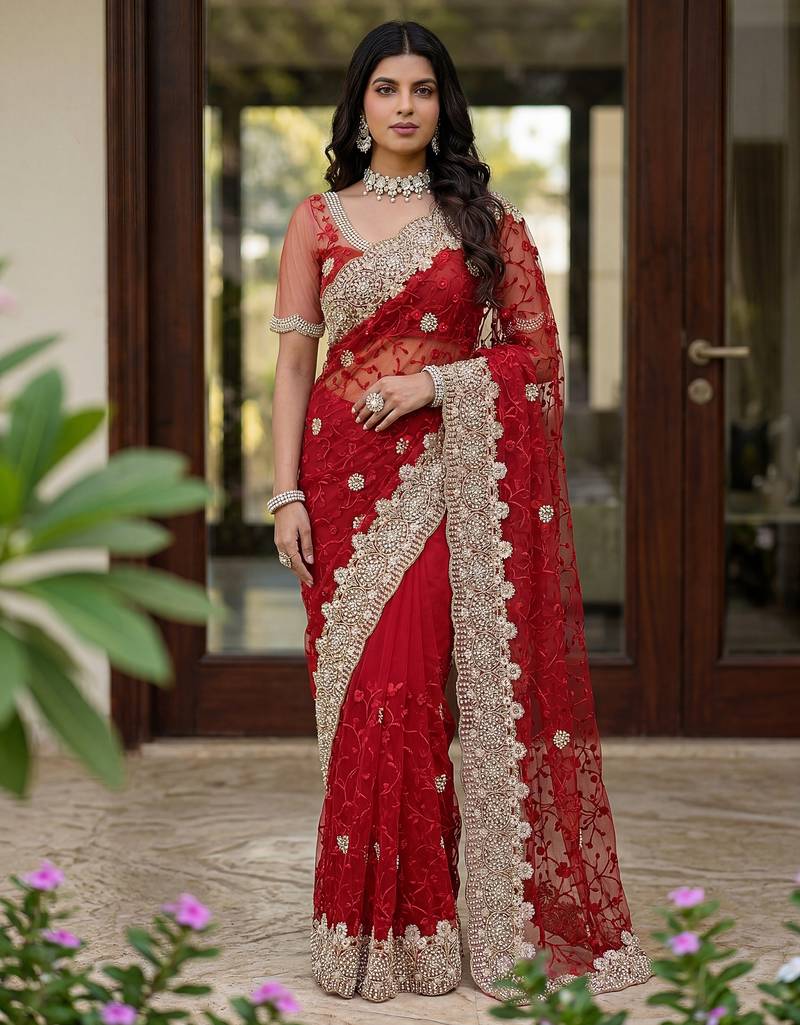 Blue color net fabric wedding wear heavy embroidery work with pearls diamonds work saree