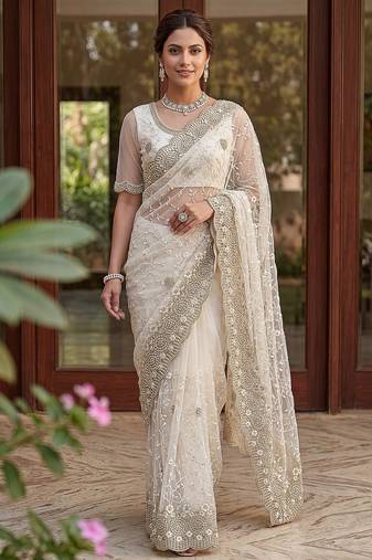 Blue color net fabric wedding wear heavy embroidery work with pearls diamonds work saree