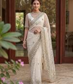 Blue color net fabric wedding wear heavy embroidery work with pearls diamonds work saree