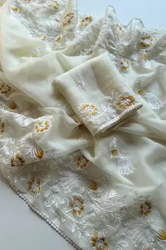 white chiffon saree with floral bird embroidery design