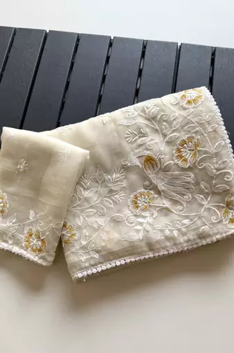 white chiffon saree with floral bird embroidery design