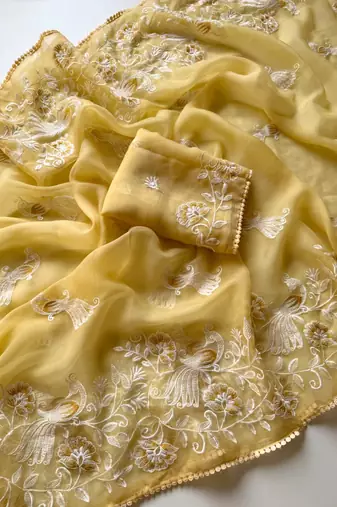 yellow chiffon saree with bird floral embroidery work