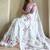 White Color  Flower Embroidory Work Tissue Saree