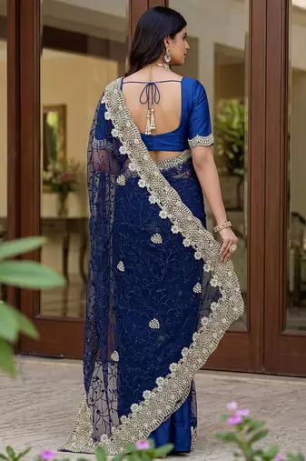 Blue color net fabric wedding wear heavy embroidery work with pearls diamonds work saree