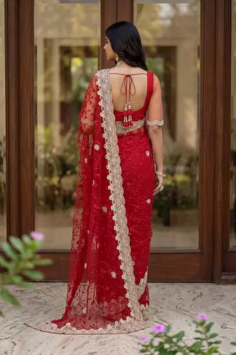 Blue color net fabric wedding wear heavy embroidery work with pearls diamonds work saree