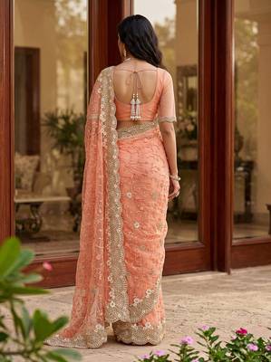 Blue color net fabric wedding wear heavy embroidery work with pearls diamonds work saree 2