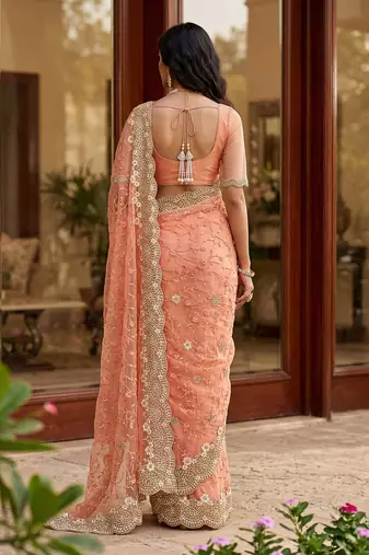 Blue color net fabric wedding wear heavy embroidery work with pearls diamonds work saree