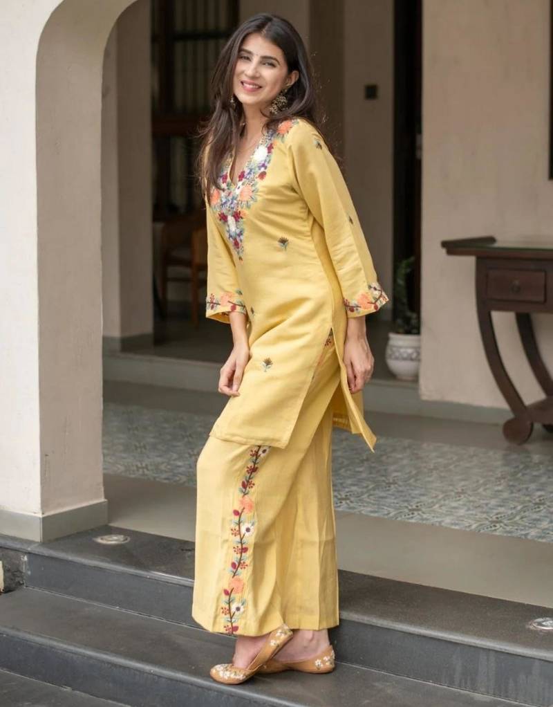 yellow crepe embroidered kurta sets