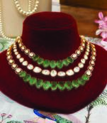 Gold plated kundan green stones multi layered necklace set