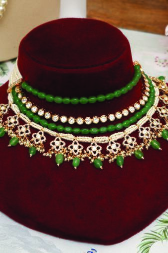 Gold plated kundan green stones multi layered necklace set