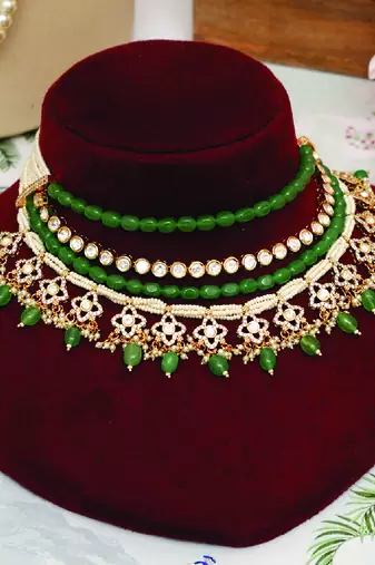 Gold plated kundan green stones multi layered necklace set