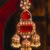 Gold plated red stones jhumkas