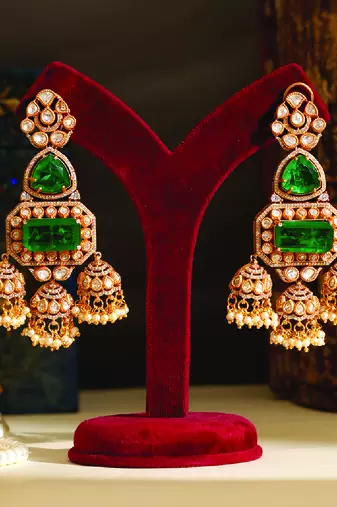 Gold plated green stones jhumkas