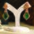 Gold plated green stones danglers