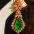 Gold plated green stones danglers