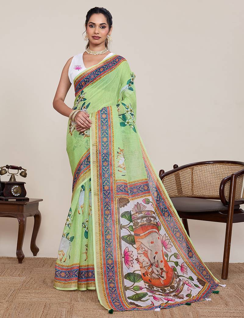 Light green printed linen saree with floral design zari border blouse casual festival wear saree