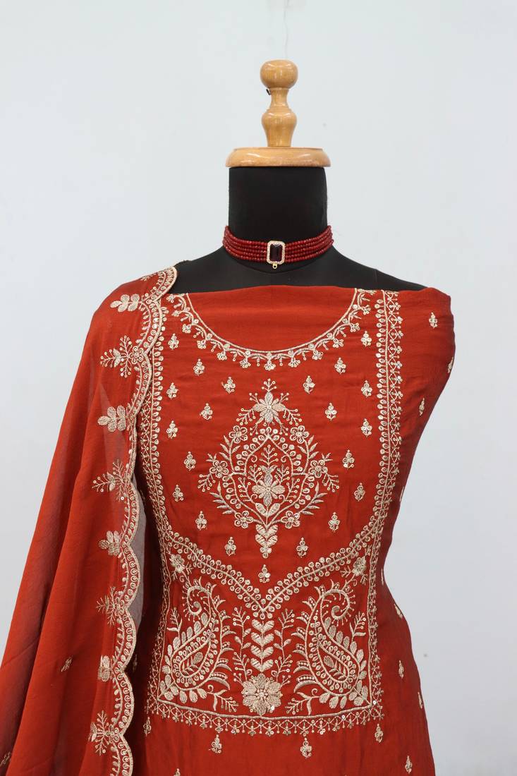 Orange color party wear rangoli silk embroidery work salwar suit