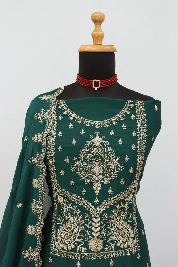 Green color party wear rangoli silk embroidery work salwar suit