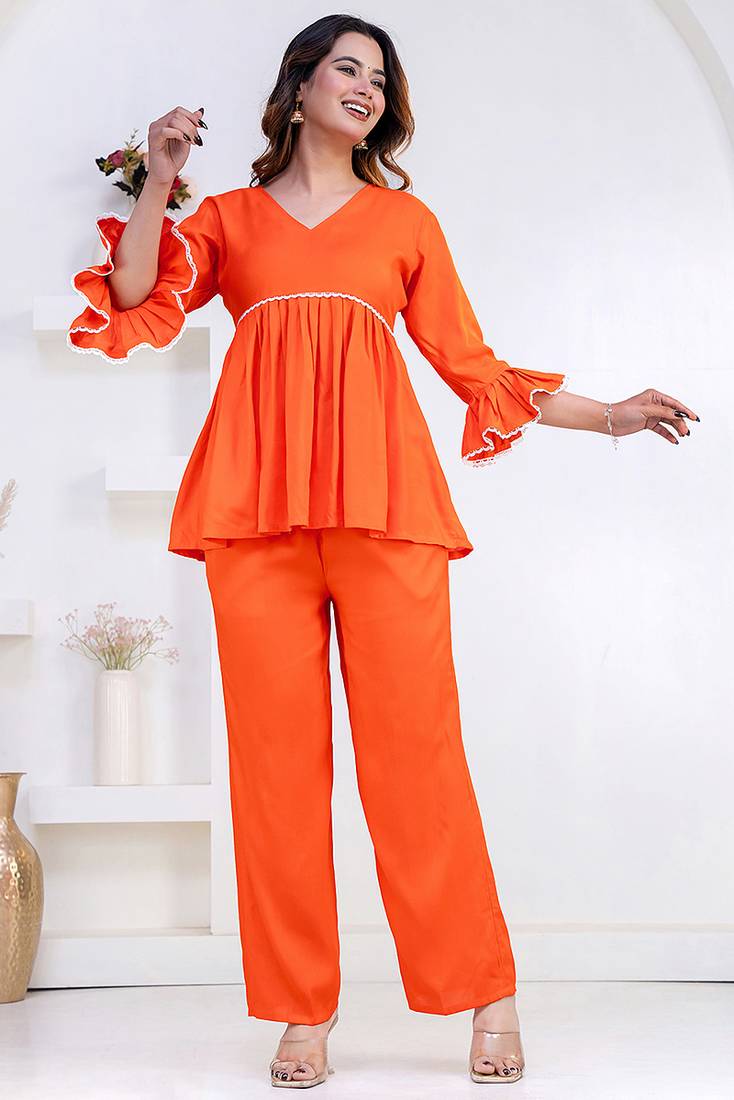 orange rayon stitched kurti set with lace design