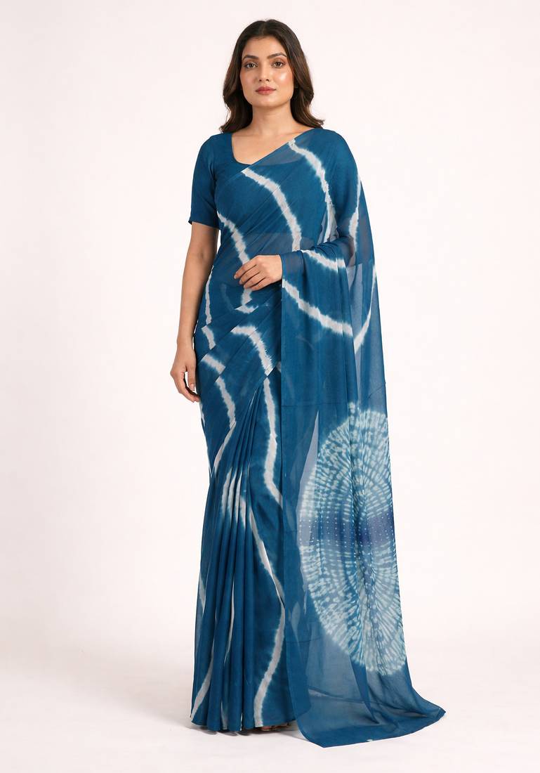 Teal printed art silk saree with blouse piece